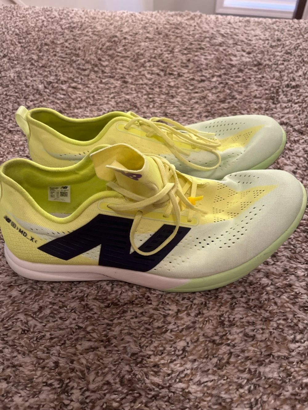 New Balance Bright Yellow Lace-Up track spikes with Black Logo